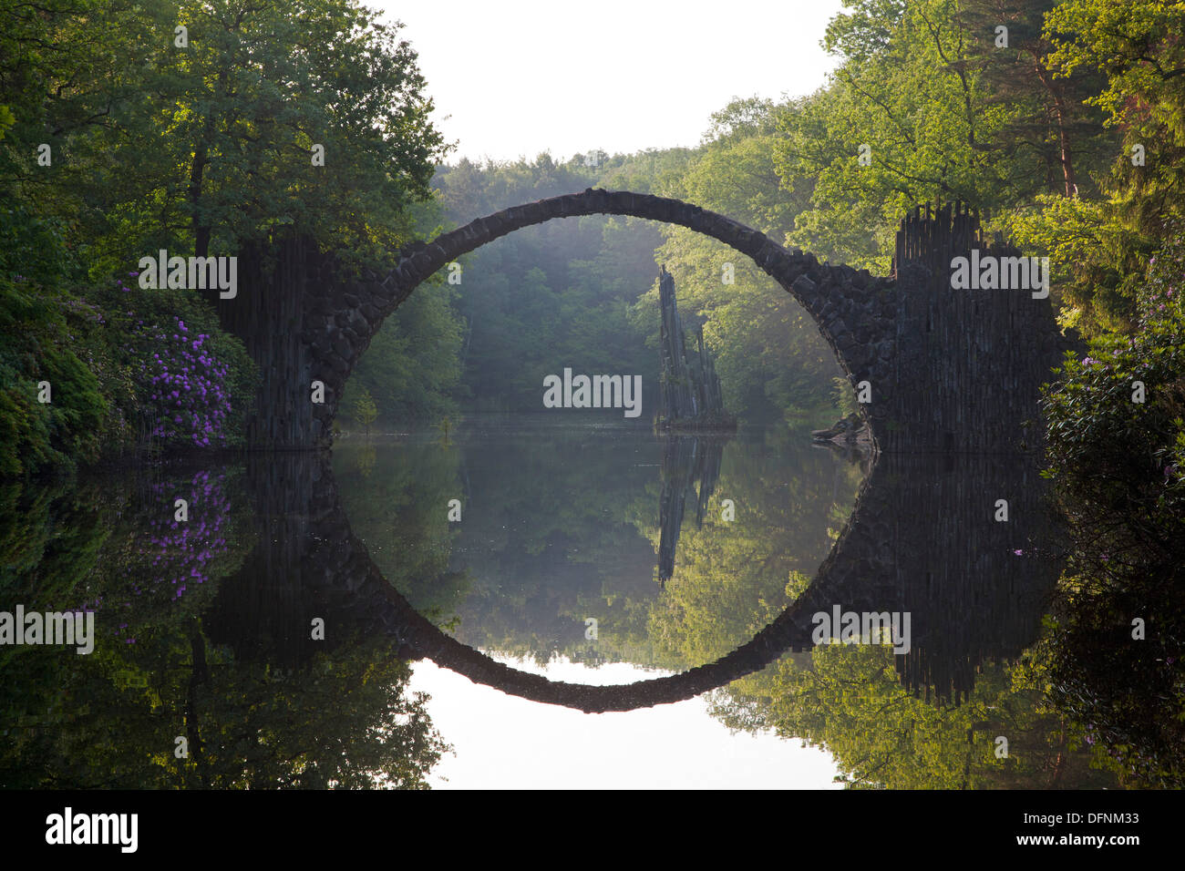 Rakotz bridge reflecting in lake Rakotzsee, Kromlau park, Kromlau, Saxony, Germany, Europe Stock Photo