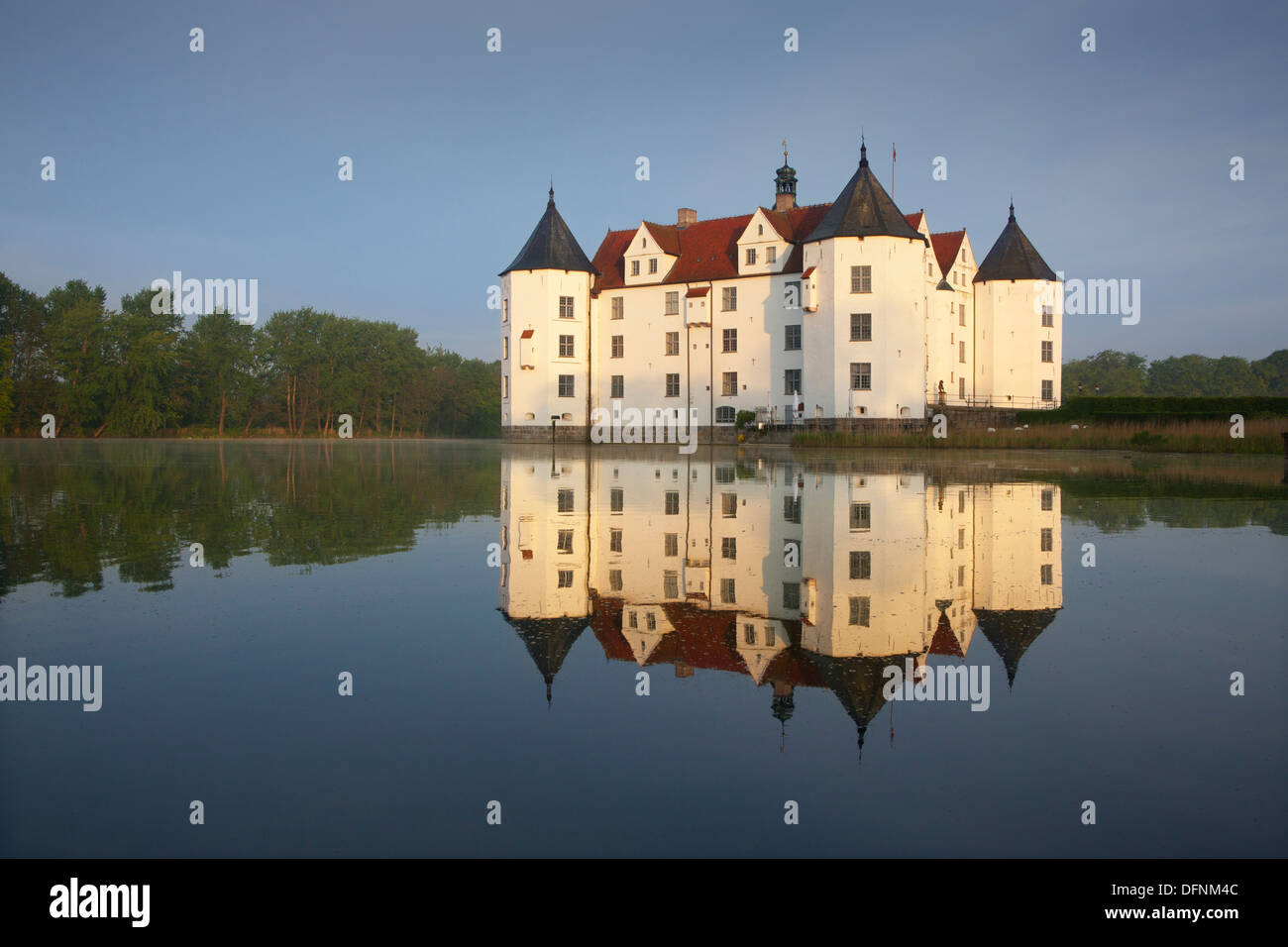 Gluecksburg moated castle reflecting in Flensburg fjord, Baltic Sea ...