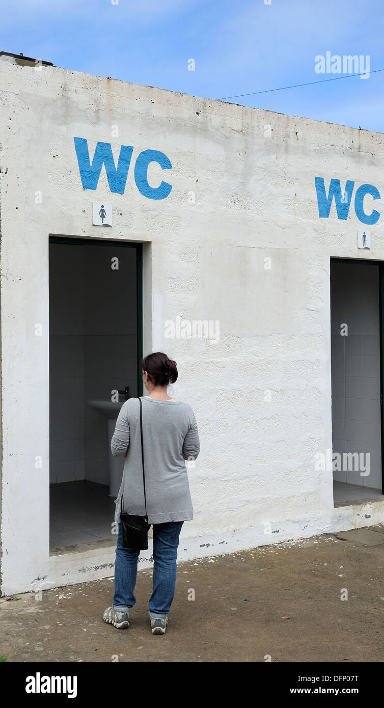 An outside toilet block male and female Stock Photo