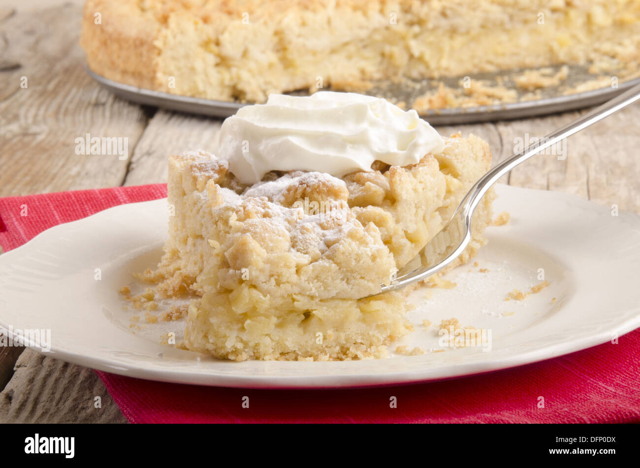 crumb cake with powdered sugar and cream Stock Photo Alamy