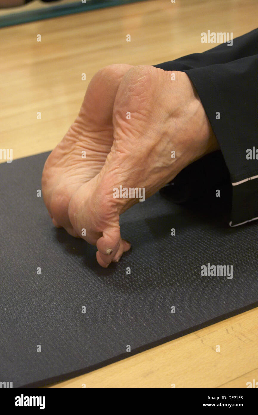 close-up of feet in pilates class stretching on toes Stock Photo - Alamy