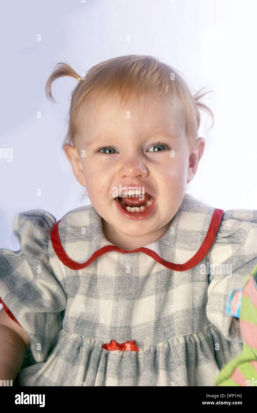 3-year-old-girl-smiling-into-camera-stock-photo-alamy