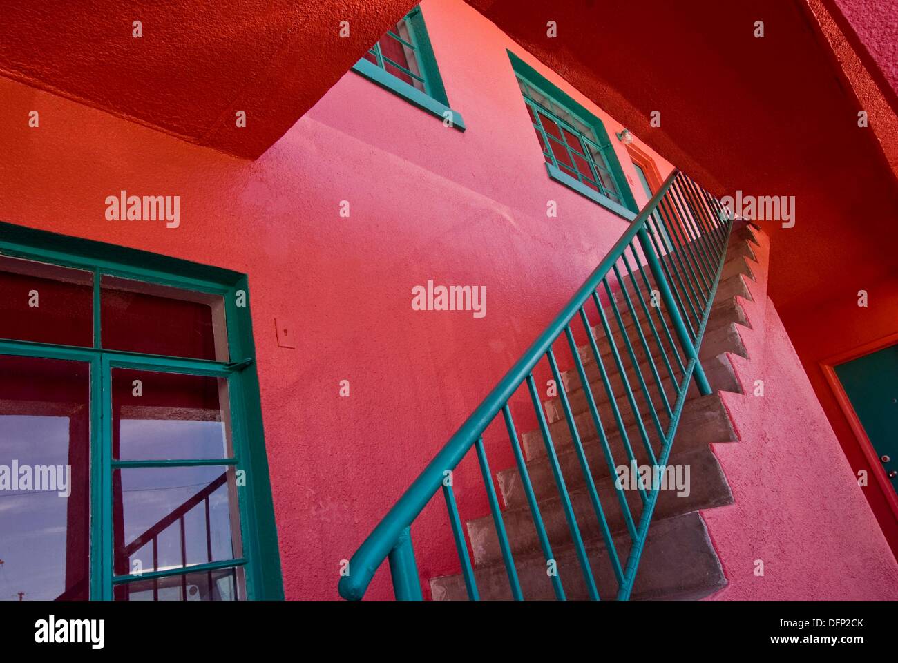 Stairway at brightly colored apartment building, Truth or Consequences, New Mexico, USA Stock