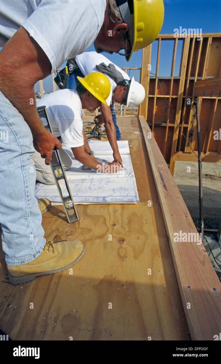 Construction Foreman Giving Instructions To Carpenters On Jobsite For School Construction Antelope California Usa Stock Photo Alamy