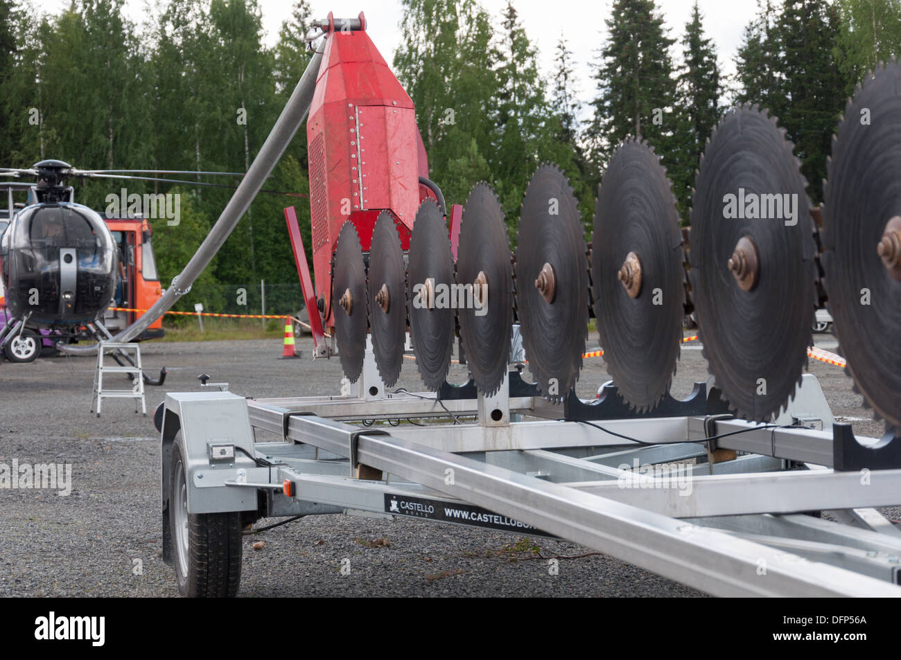 This is a helicopter operated saw used to cut down trees near power lines Stock Photo Alamy