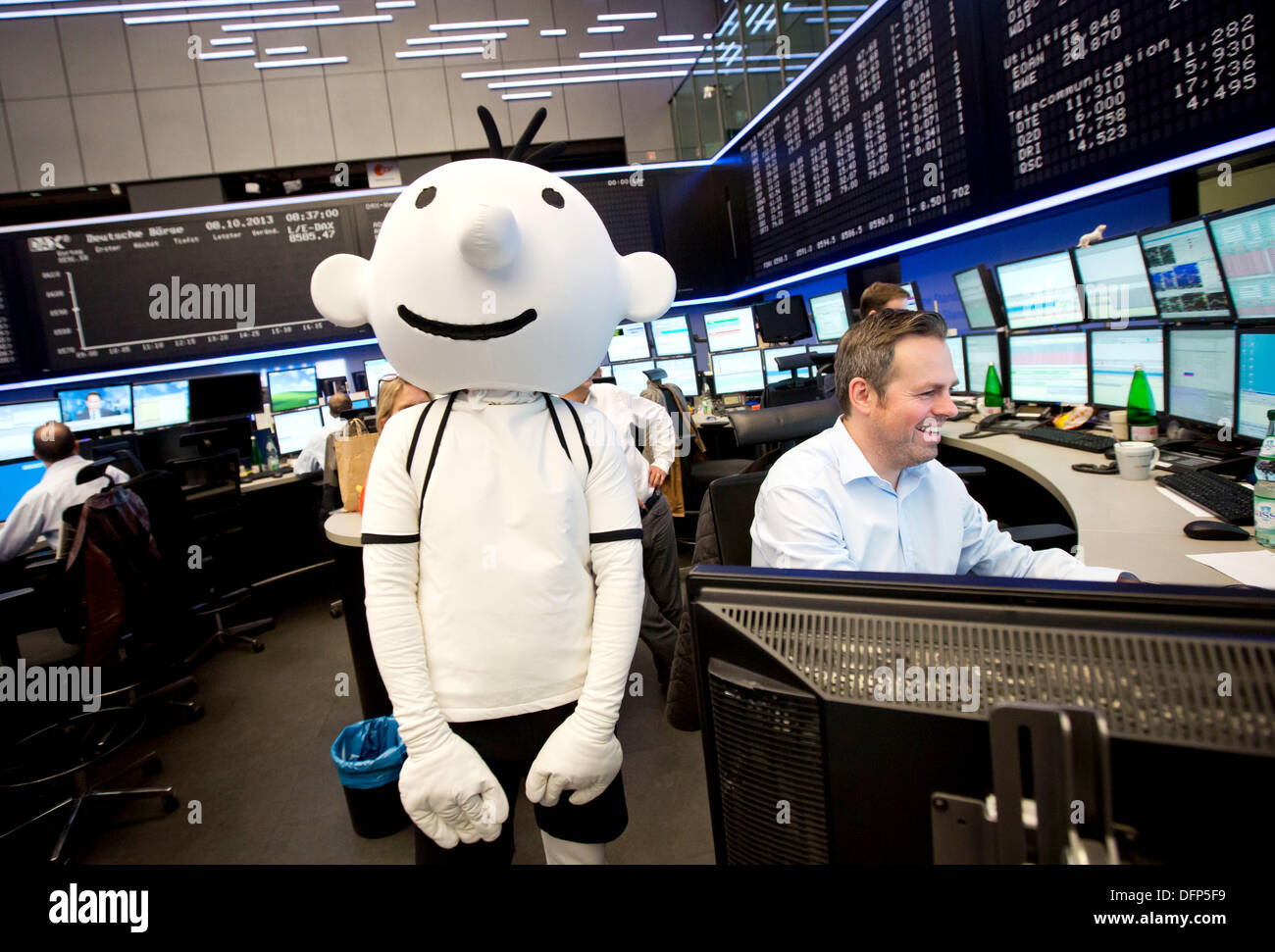 Frankfurt Main, Germany. 08th Oct, 2013. An actor dressed as the main protagonist of the book series 'Diary of a wimpy Kid', Gregory 'Greg' Heffley, is pictured at the stock exchange shortly before the publishing house Bastei Luebbe went public at the stock exchange in Frankfurt Main, Germany, 08 October 2013. 'Diary of a wimpy Kid' is one of Bastei Luebbe's best sellers. Photo: FRANK RUMPENHORST/dpa/Alamy Live News Stock Photo