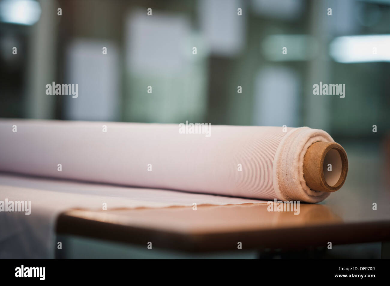 Close-up of a spool of fabric Stock Photo - Alamy