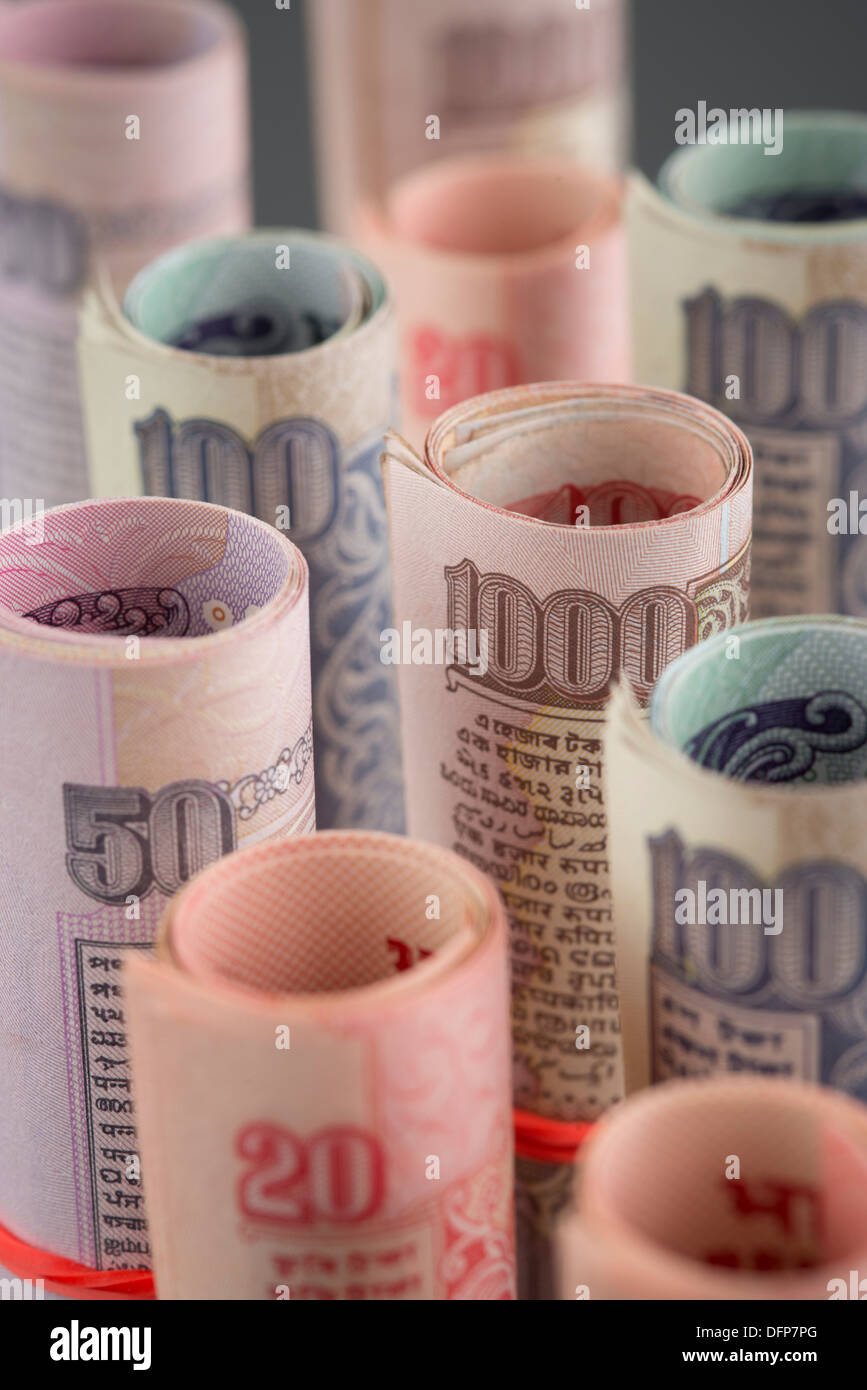 Close-up of rolled-up Indian paper currency Stock Photo