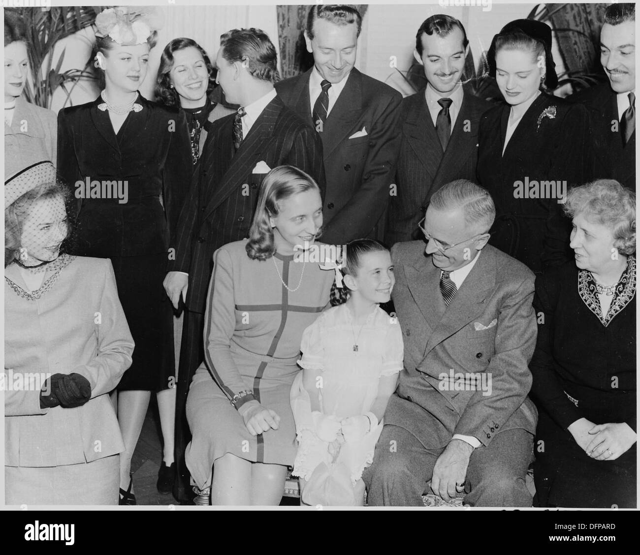 Marget Ruman This photograph features Margaret O'Brien sitting between President ...