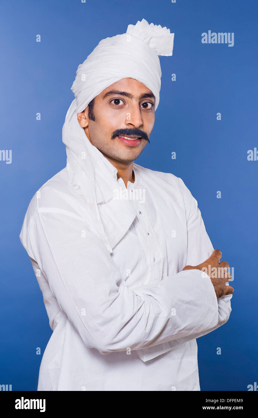 Portrait of a farmer standing with his arms crossed Stock Photo - Alamy