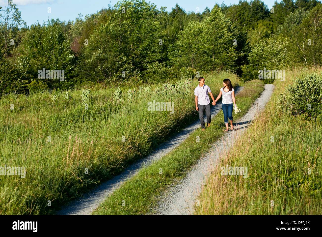 Teen couple walking holding hands hi-res stock photography and images ...