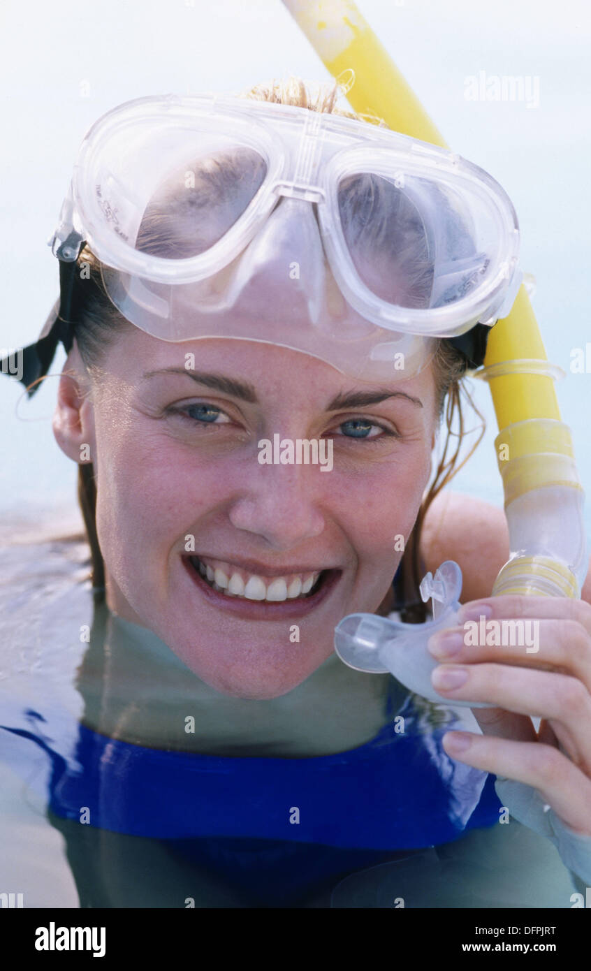 wearing snorkel mask and goggles Stock Photo Alamy