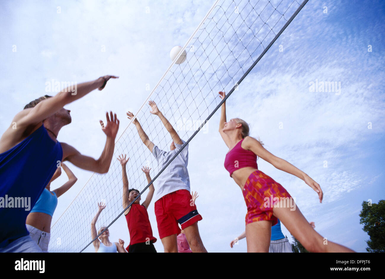 teens playing beach volleyball Stock Photo Alamy