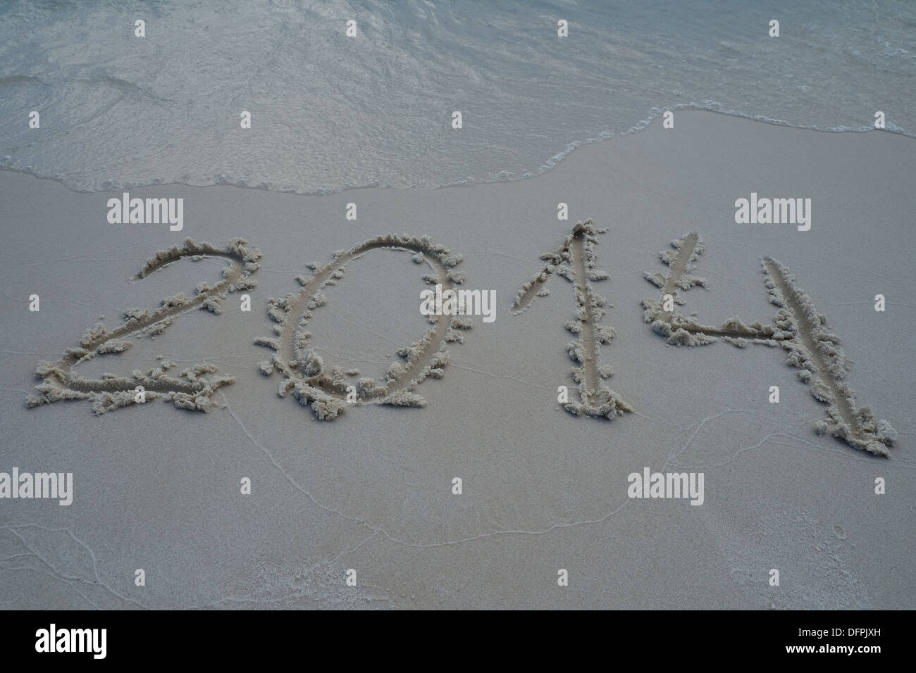 2014 year written on the sand beach Stock Photo - Alamy