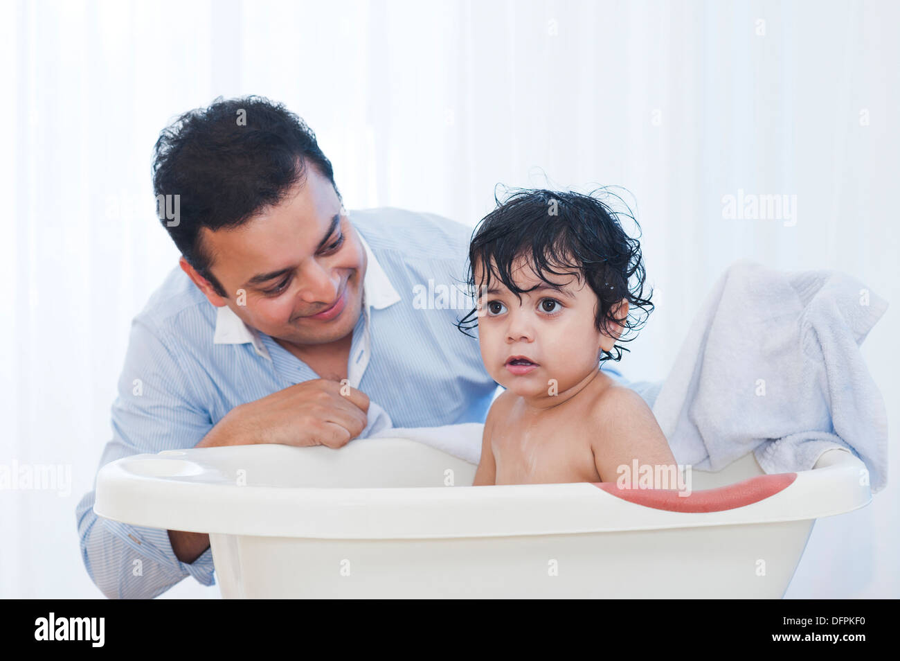 giving bath to baby