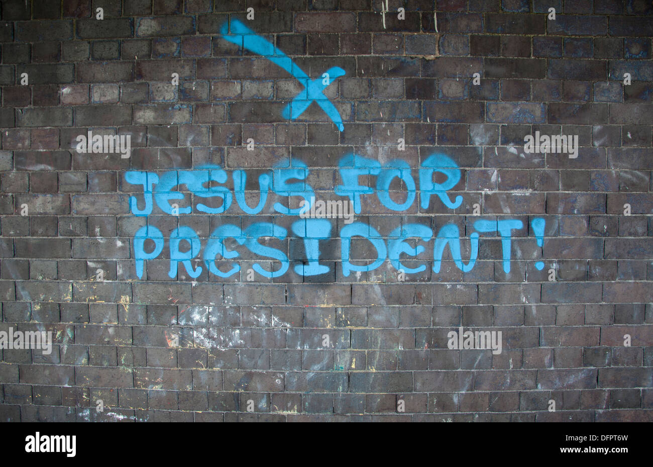 'Jesus for President' graffiti on a brick wall, Bristol, UK Stock Photo
