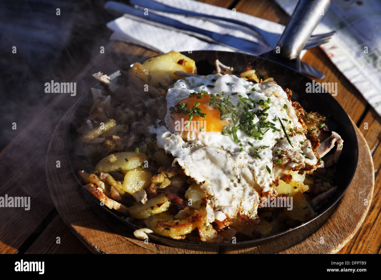 Austria, Tyrol, Kitzbuhel, Skiing, Melkalm, Hut, Bratkartoffeln with egg, Stock Photo