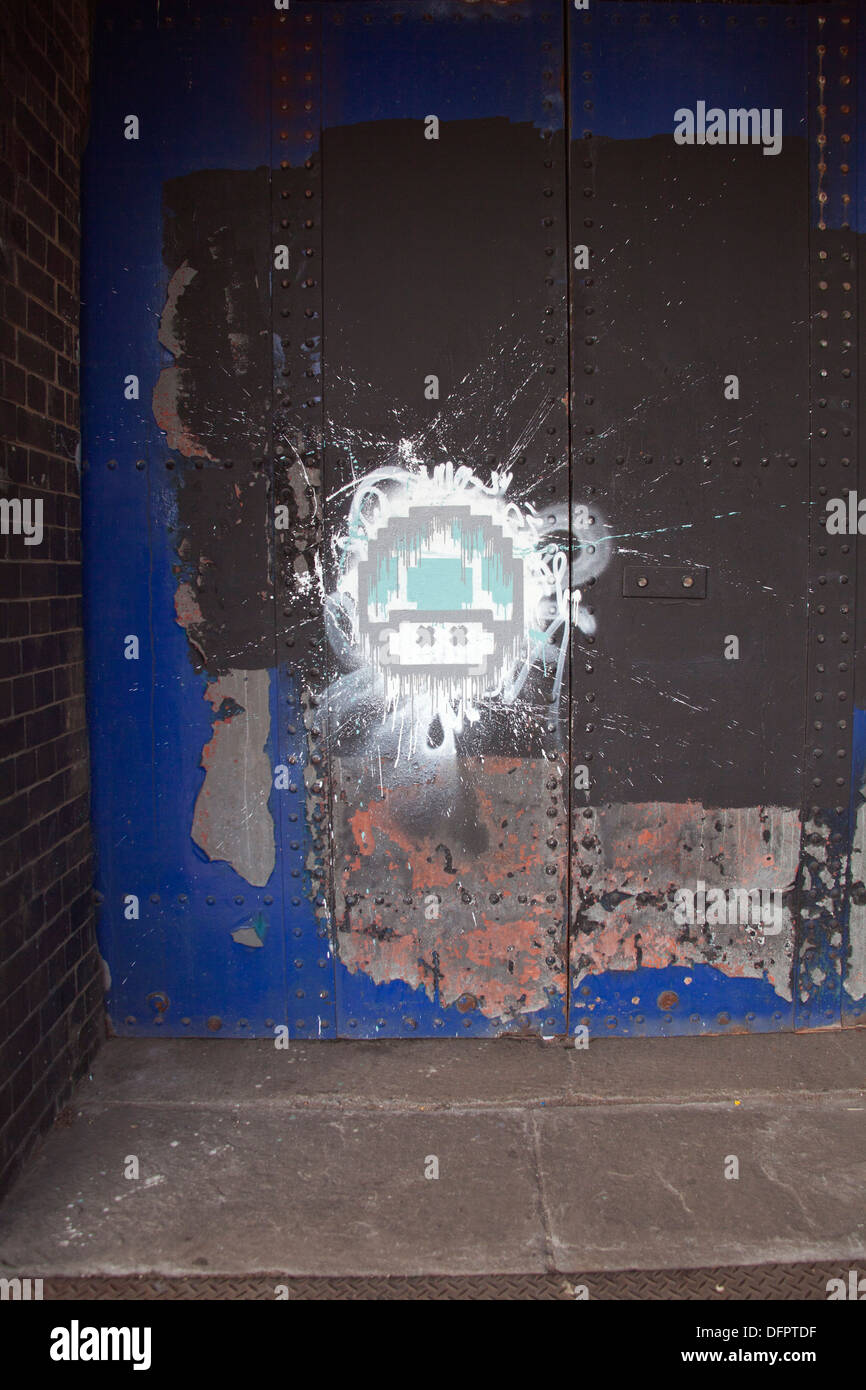 Super Mario Mushroom graffiti on an industrial door, Bristol, UK Stock Photo