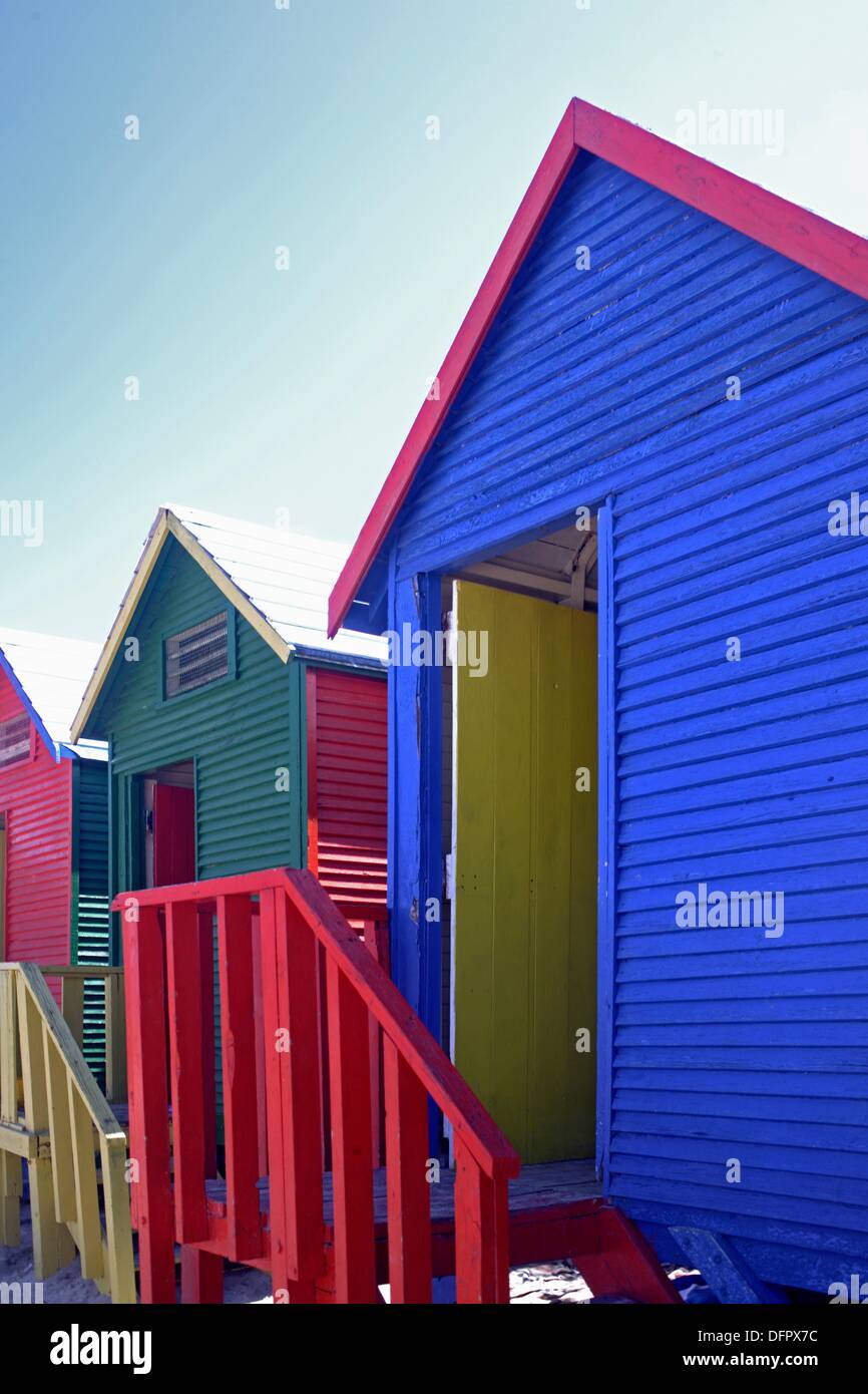 Colorful Beach Huts At The Sandy Beach Of St James With Blue Sky