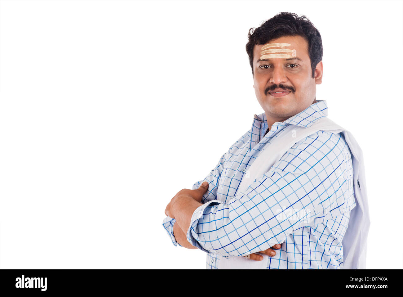 Portrait of a South Indian man with his arms crossed Stock Photo Alamy