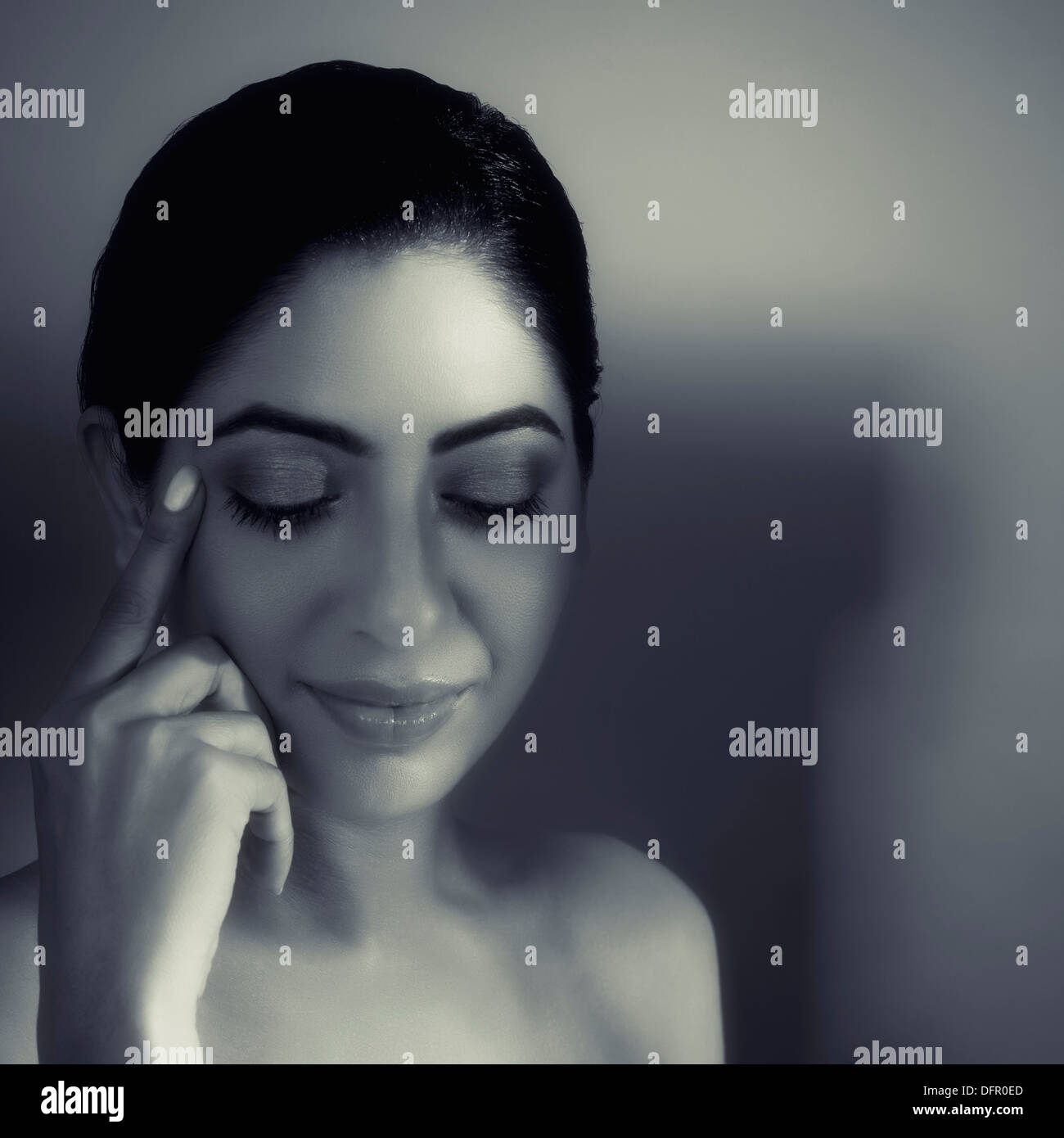 Close-up of a beautiful woman with her eyes closed Stock Photo - Alamy