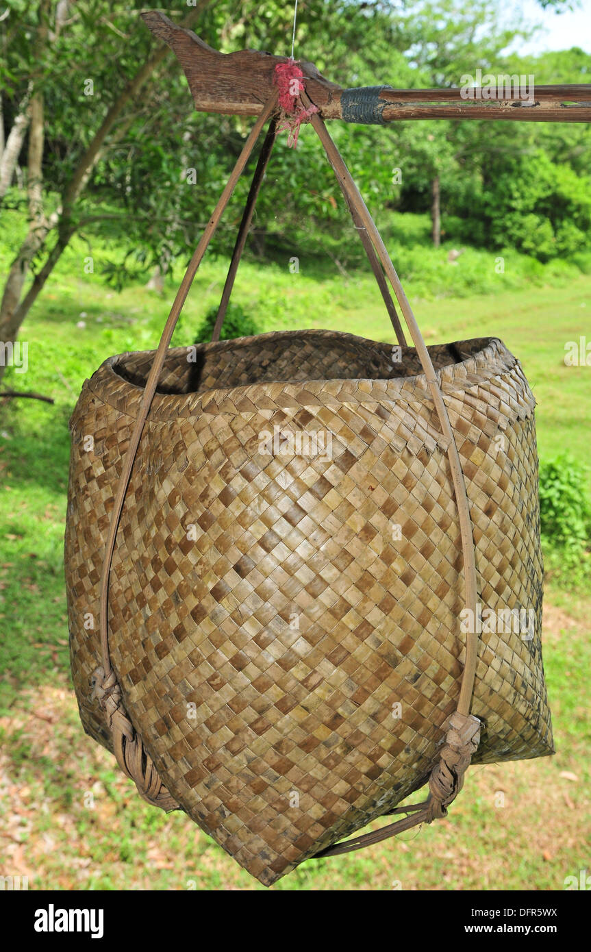Rice cultivation in Thailand - Hand-woven rice basket made from palm leaf or frond Stock Photo
