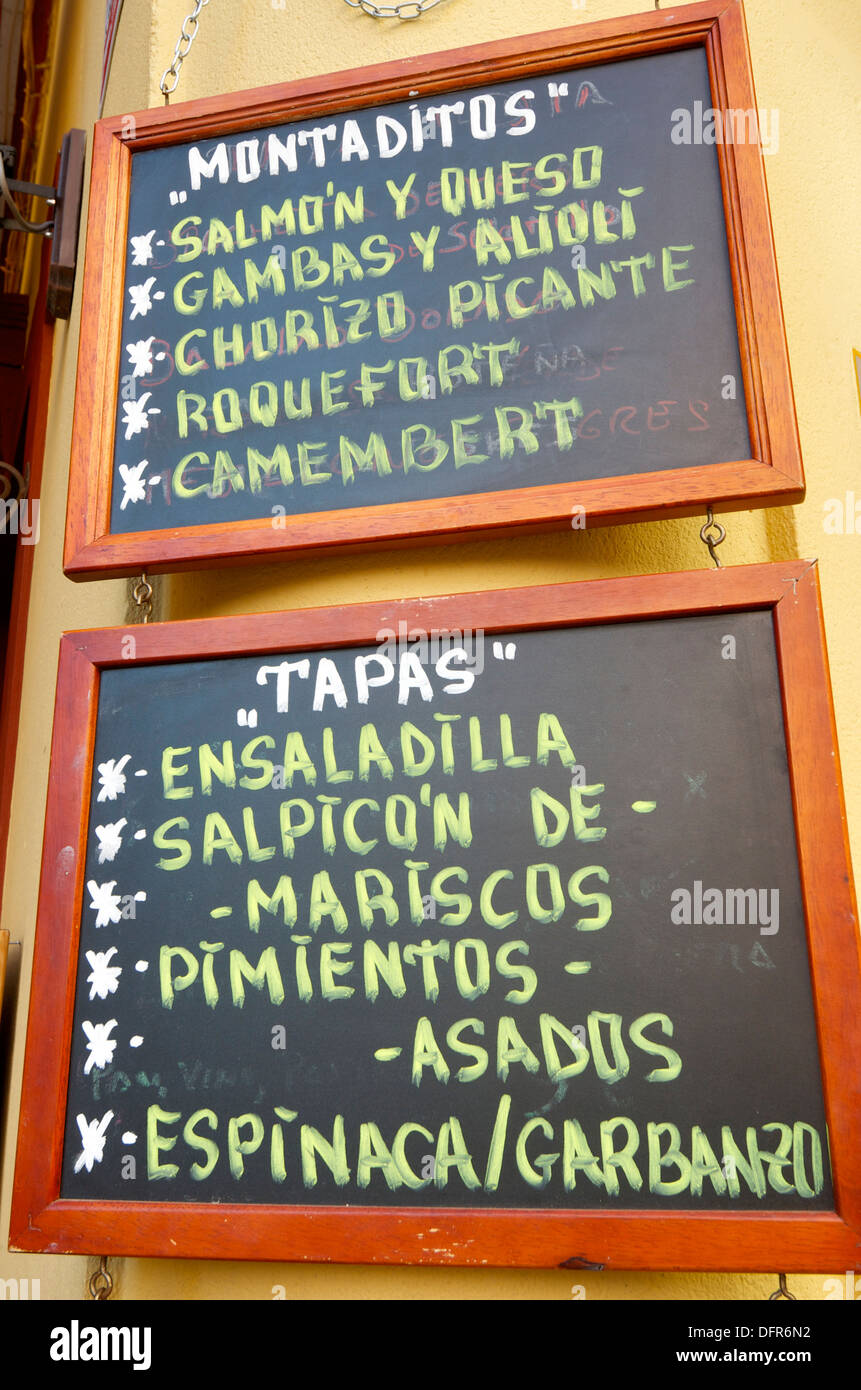 foreground of a poster of the menu in a typical Spanish restaurant