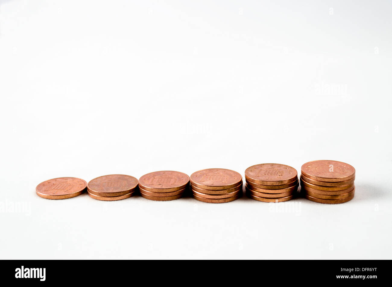 A stack of ascending pennies Stock Photo Alamy