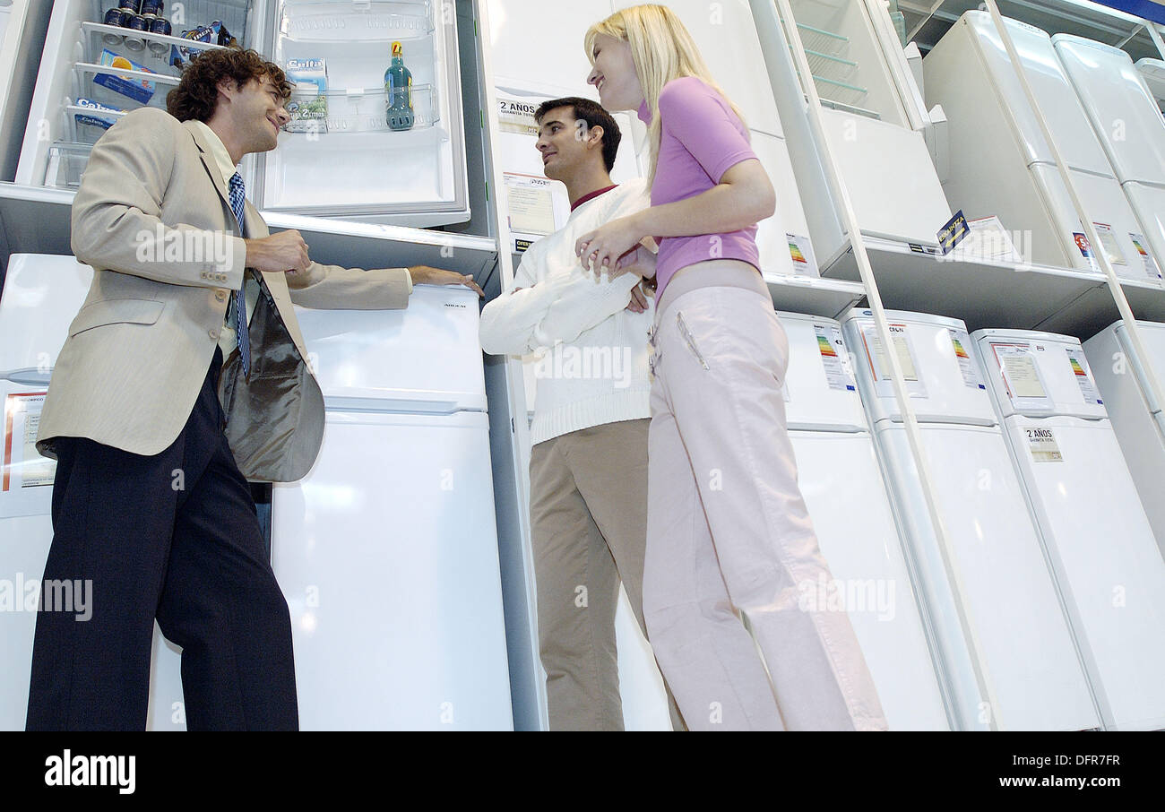 Buying a refrigerator Stock Photo Alamy