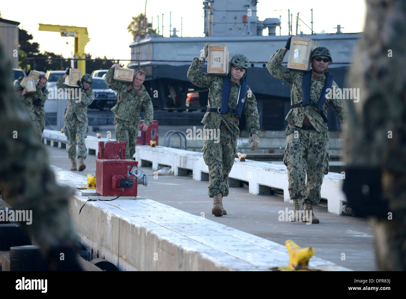 Sailors Assigned To Coastal Riverine Squadron CRS 2 Load Ammunition 