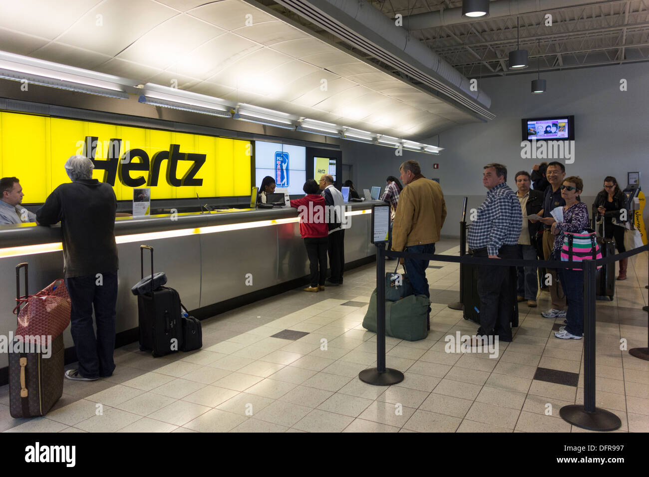 Hertz car hire counter, JFK airport, New York, USA Stock Photo