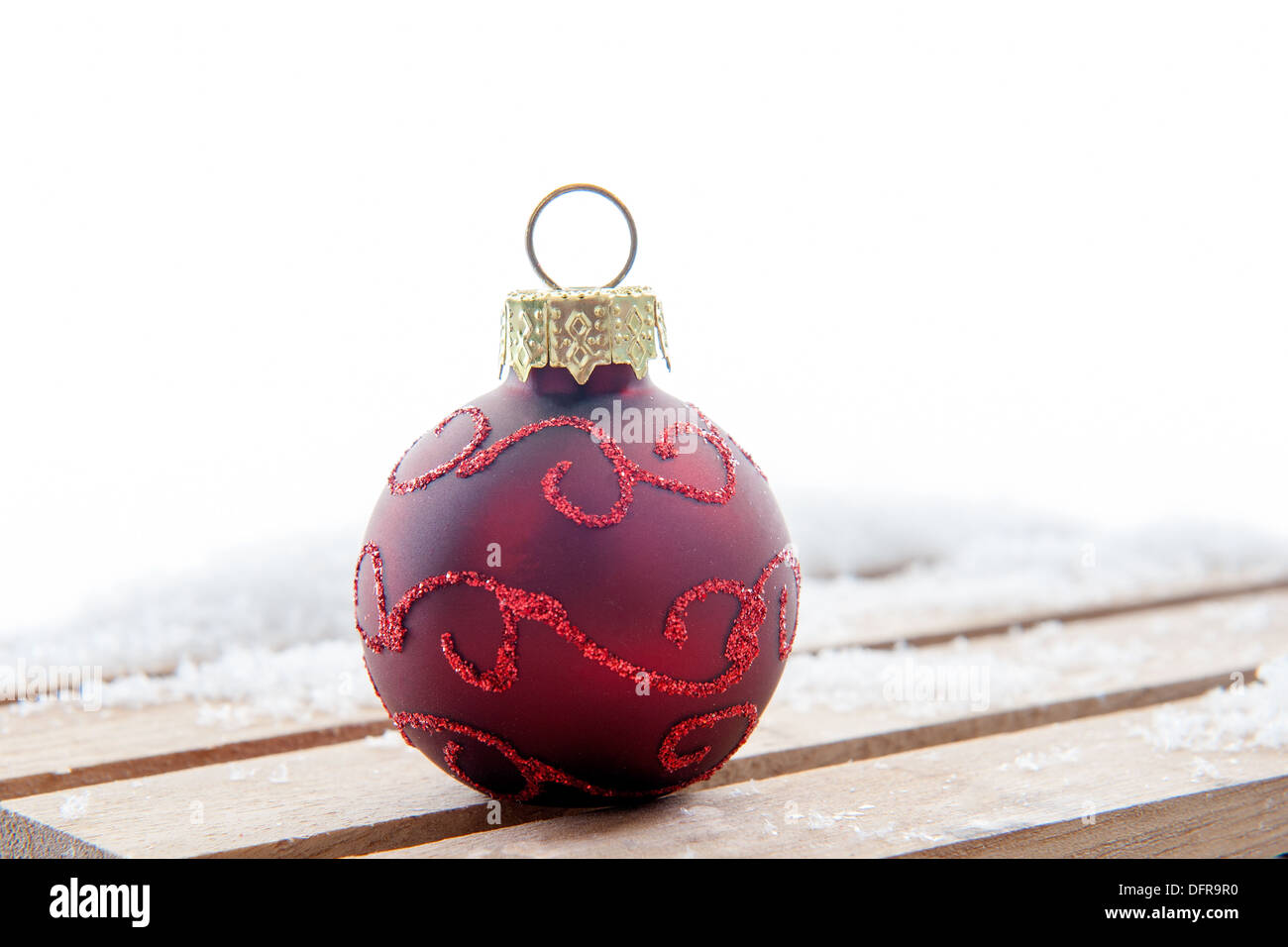 Red christmas ball in the snow hi-res stock photography and images - Alamy