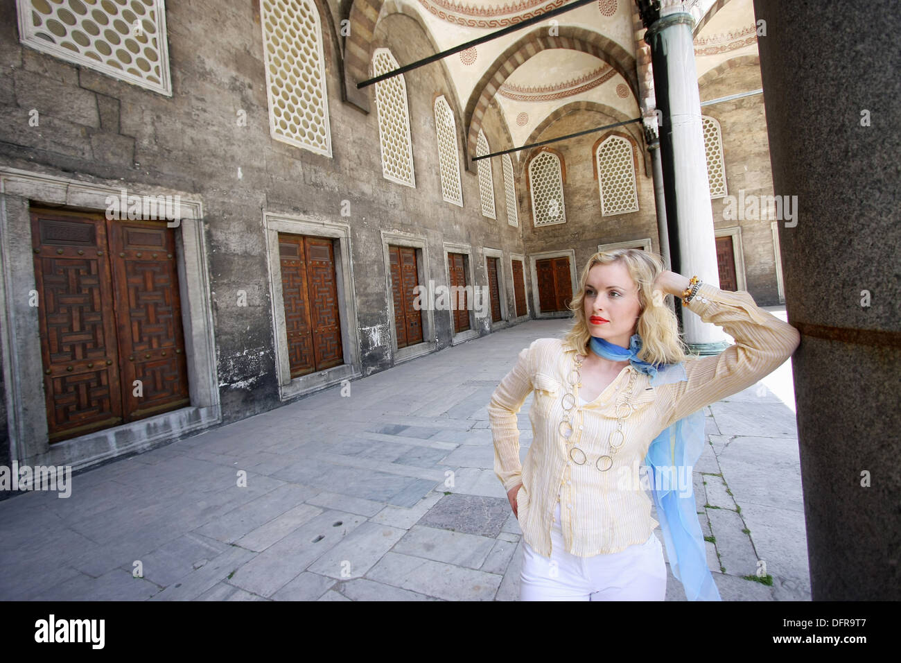 30 year old woman in the Blue Mosque, Istanbul. Turkey Stock Photo