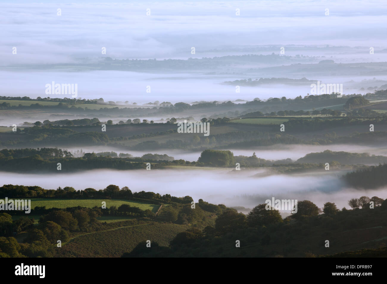 Early morning autumn mist over Belstone Cleave and the surrounding Devon countryside. Stock Photo