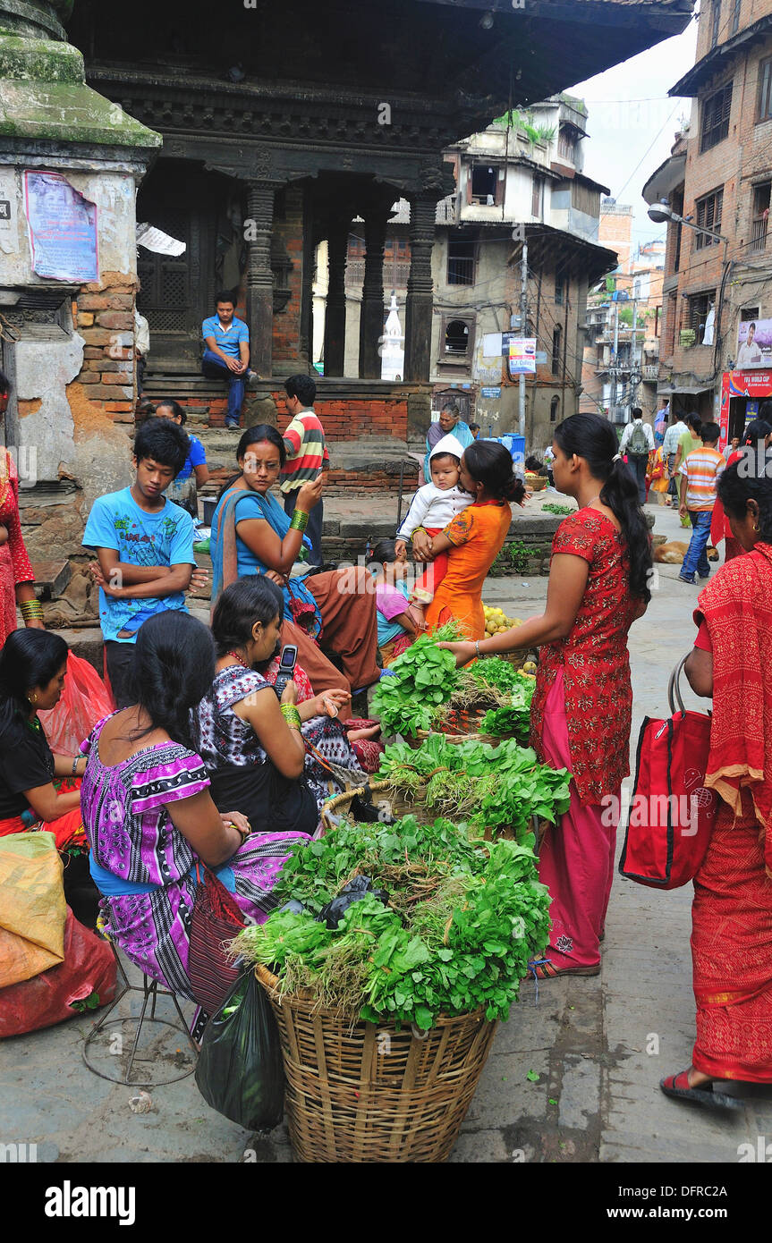 The day in Kathmandu start early. Vegetable market in the morning at