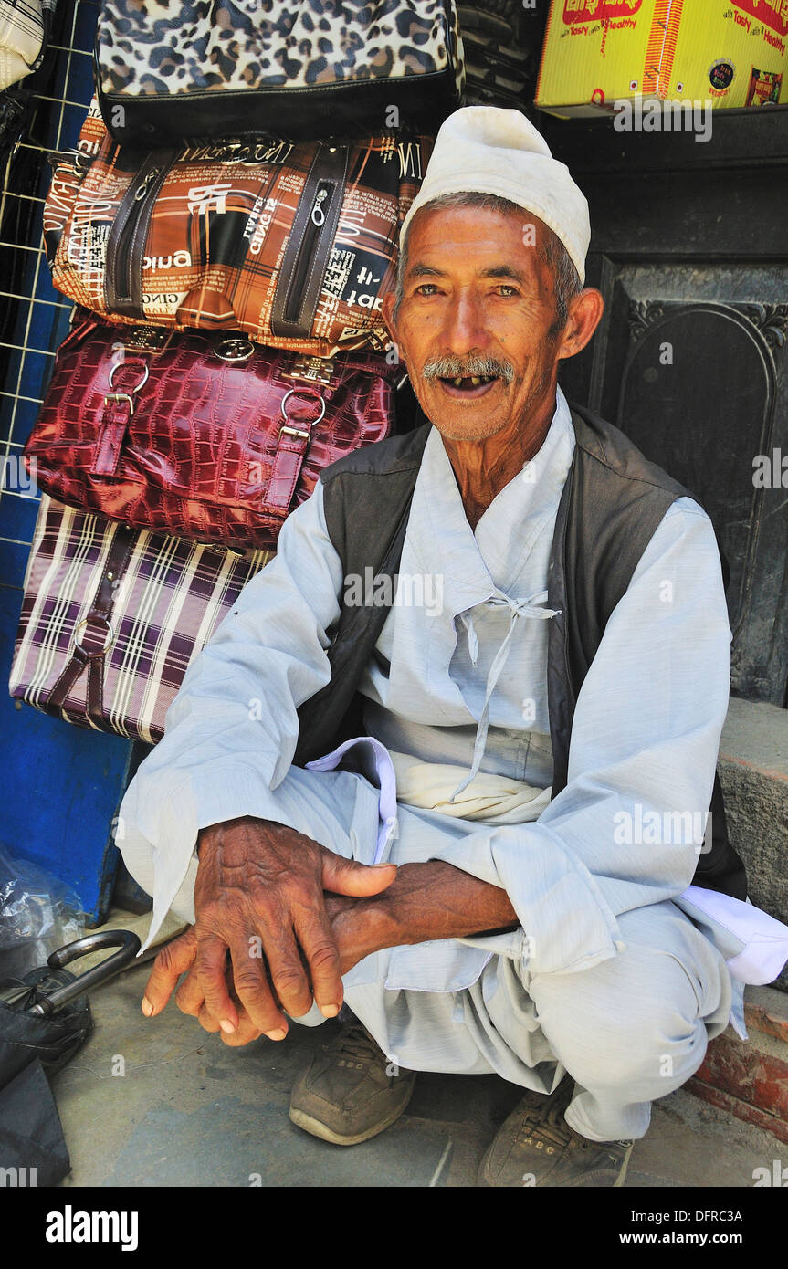 The man selling bags Stock Photo Alamy