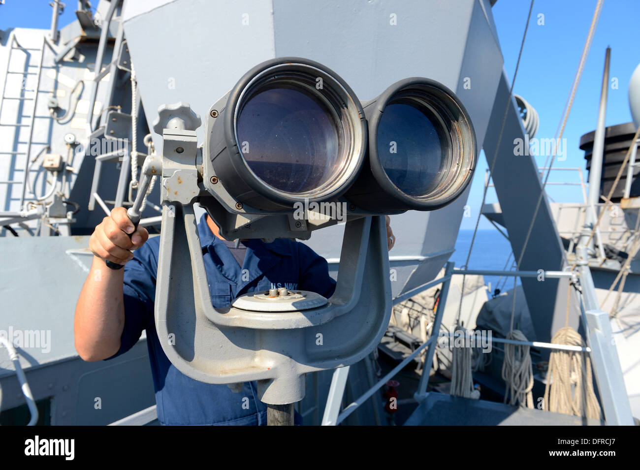 Boatswain's Mate Seaman Daniel Murphy stands watch as forward port side