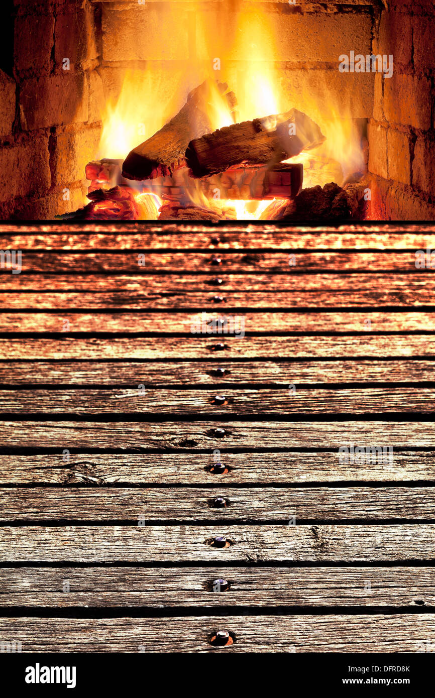 concept - edge of wooden bridge to fireplace Stock Photo