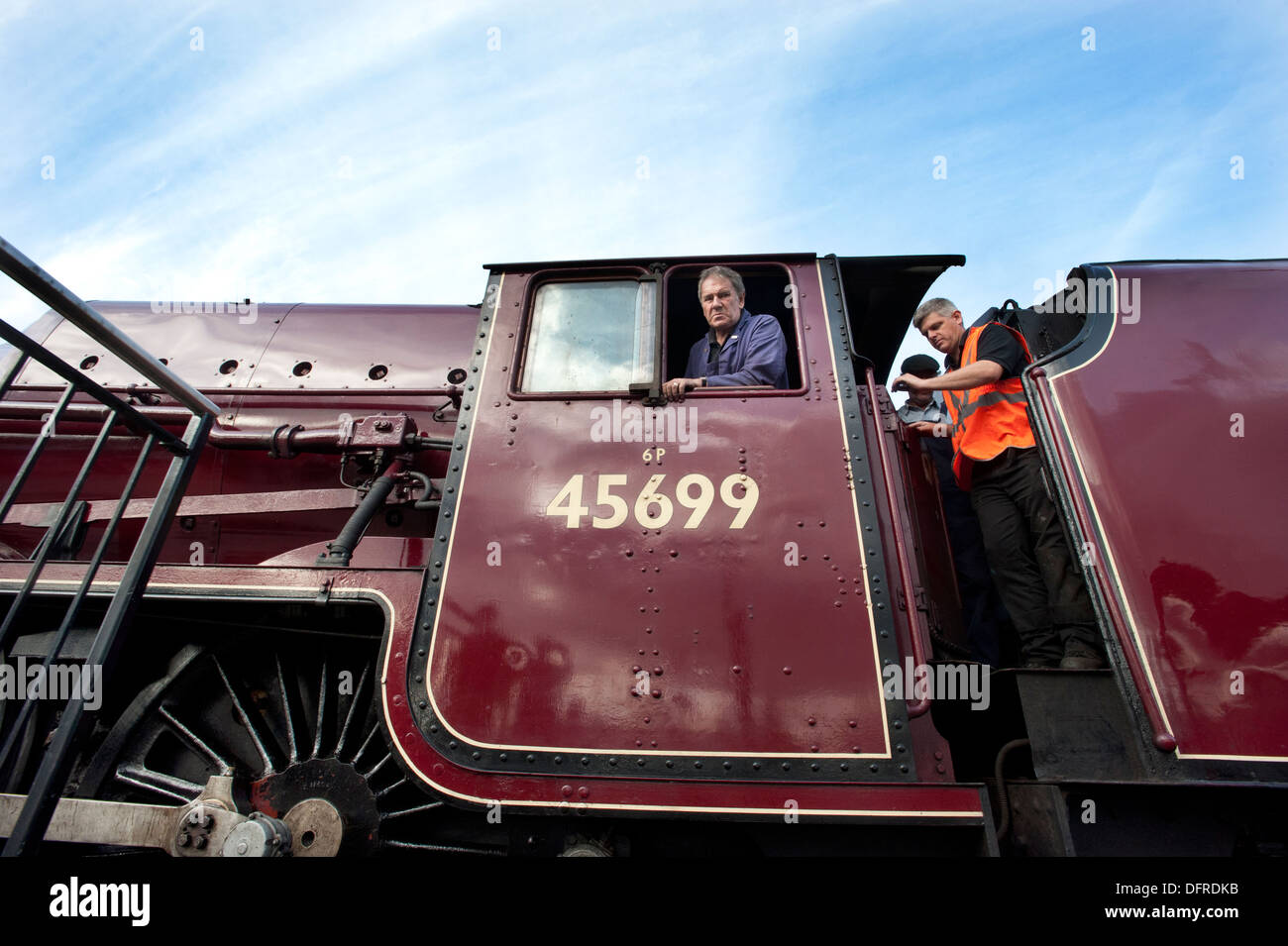 The driver and fireman of an LMS ( London Midland Scottish ) Jubilee class steam locomotive 45699 'Galatea', at 'Locomotion', part of the NRM's exhibition at the National Railway Museums Shildon museum. Stock Photo