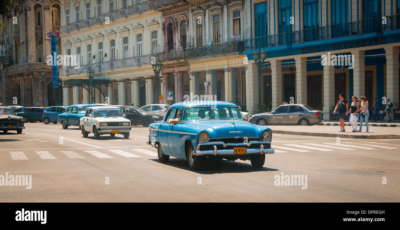 A classic Vintage American car drives on the streets of Havana, Cuba Stock Photo