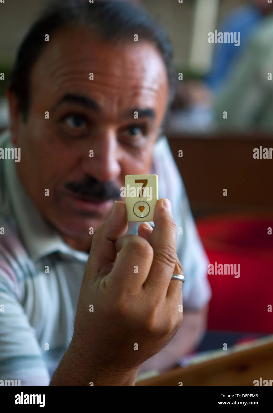 Kurdish Man Playing Dominoes,erbil, Kurdistan, Iraq Stock Photo
