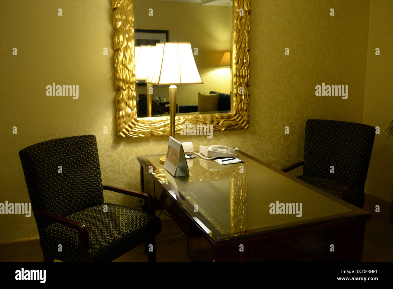 writing desk with lamp in hotel room Stock Photo Alamy