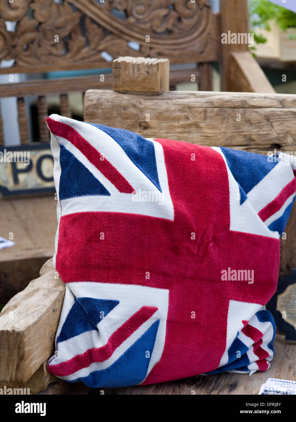 Union Jack Cushion on a wooden bench Stock Photo Alamy