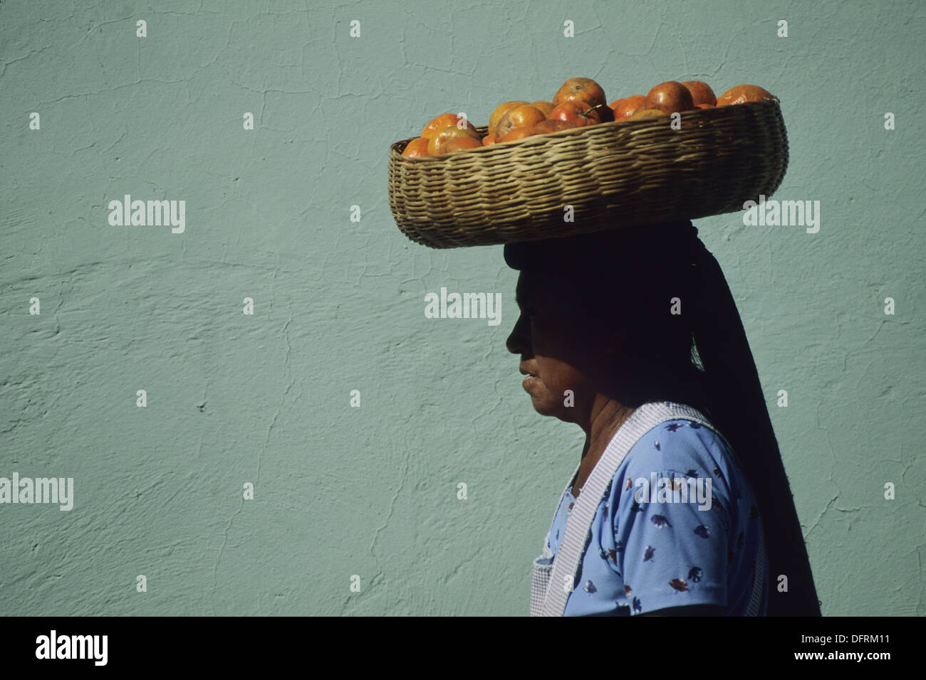 Carrying Fruit Basket On Head High Resolution Stock Photography and