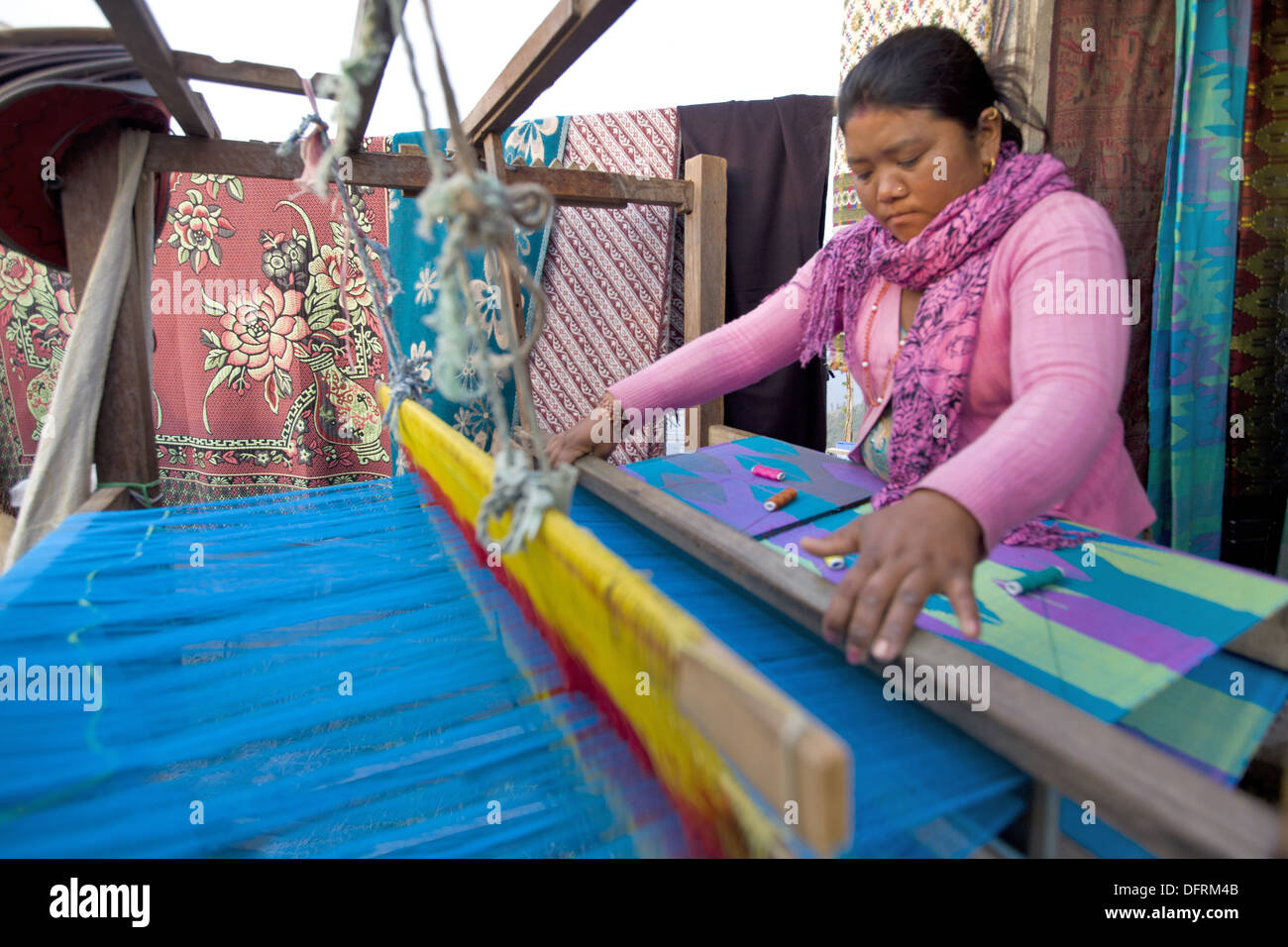 Nepali lady weaving a shawl, Nepal Stock Photo