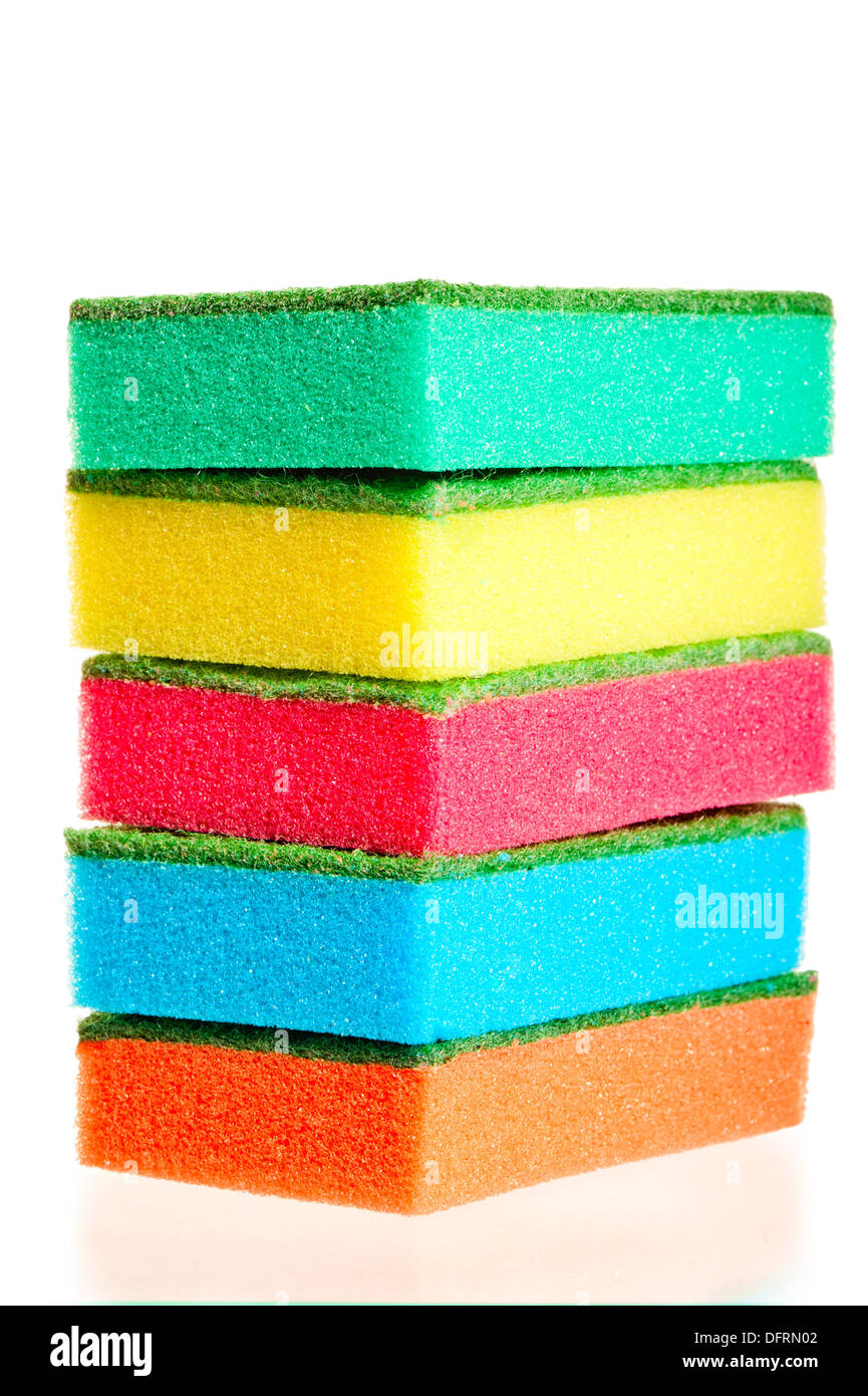 tower of colorful sponges for ware on a white background Stock Photo