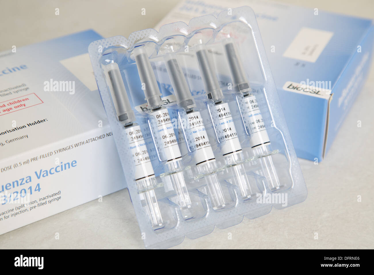 Flu vaccine 2013/2014 packaging packs and syringes for winter flu jab innoculation Stock Photo