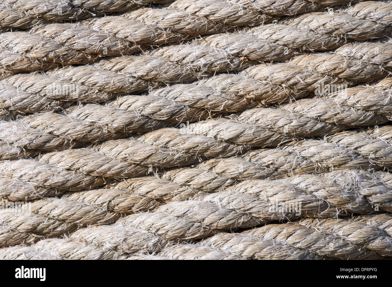 perfectly coiled rope around a pole Stock Photo - Alamy
