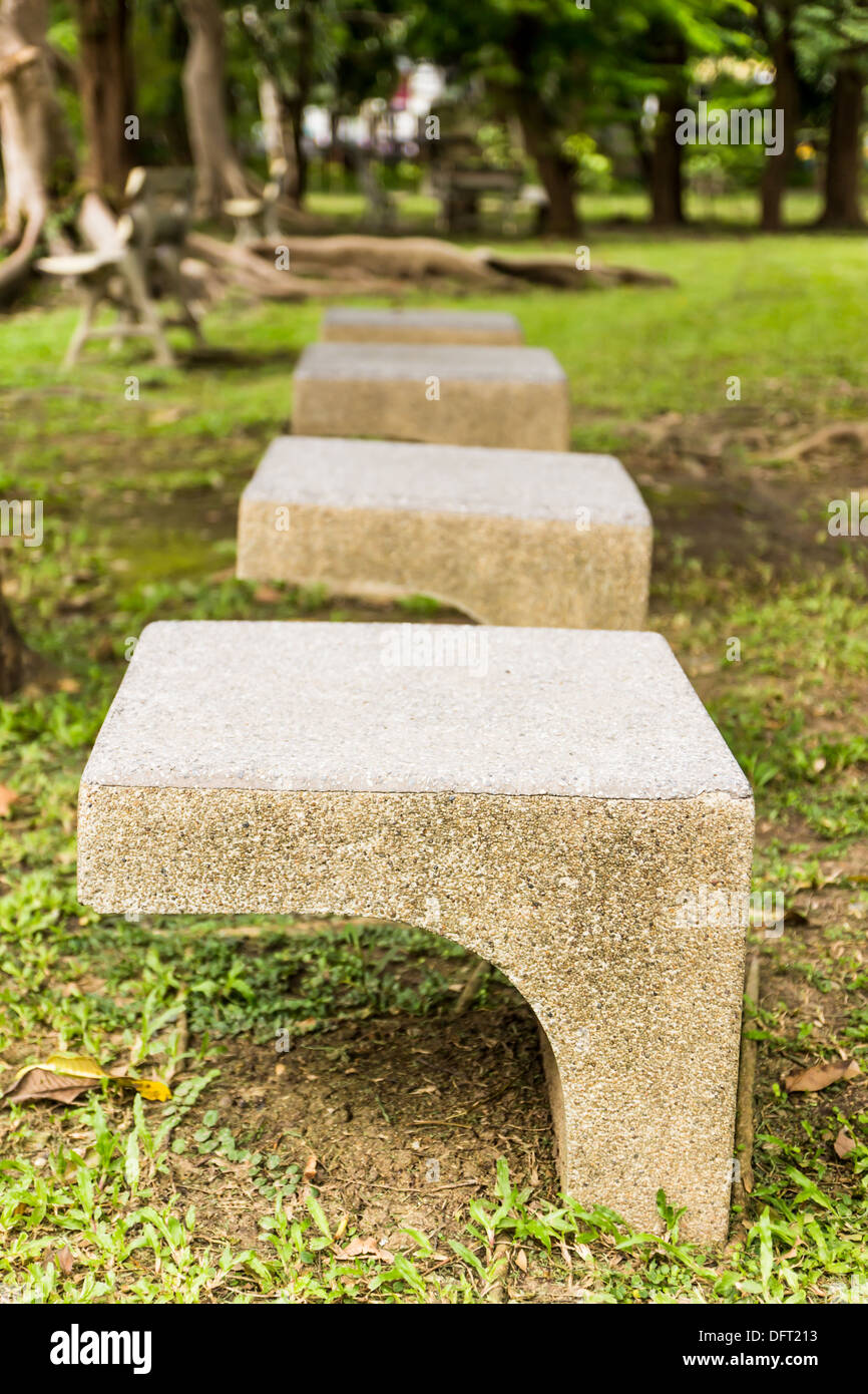 Stone chair in garden Stock Photo - Alamy