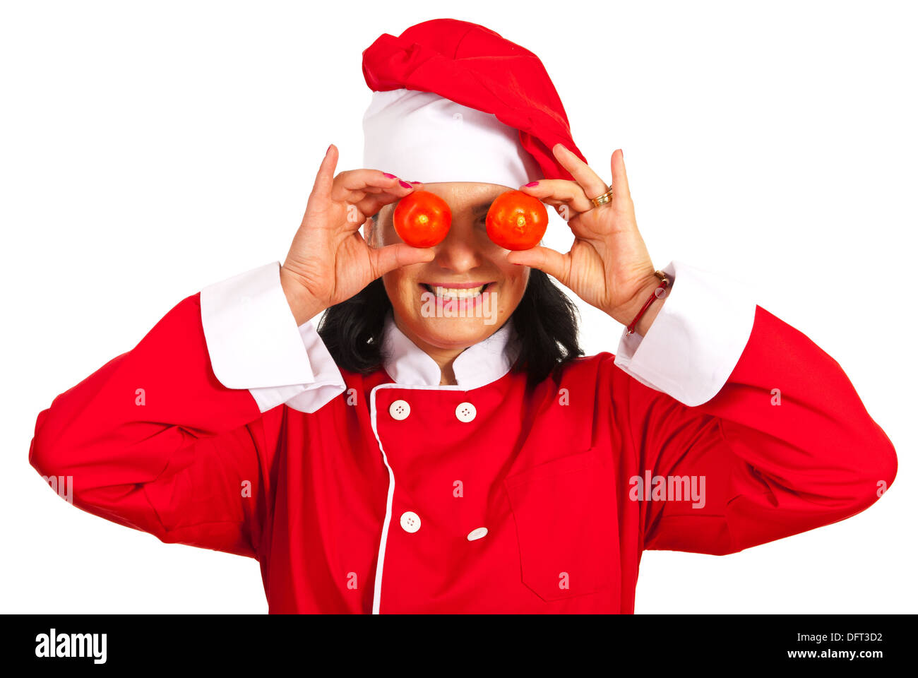 Chef woman holding tomatoes in front of eyes isolated on white ...